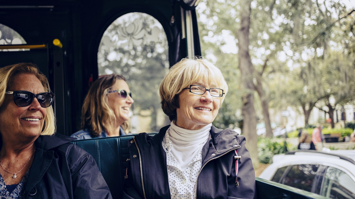 1339124912
Three women sightseeing on a trolley bus in Savannah, Georgia