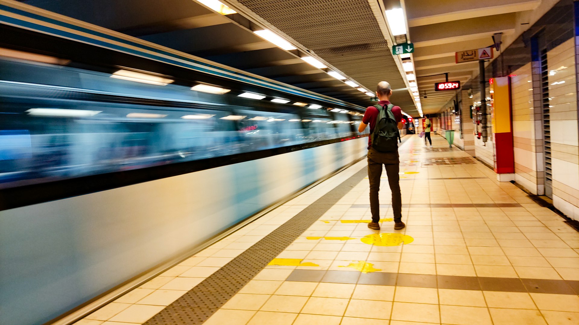 A man on a platform of Algiers Metro