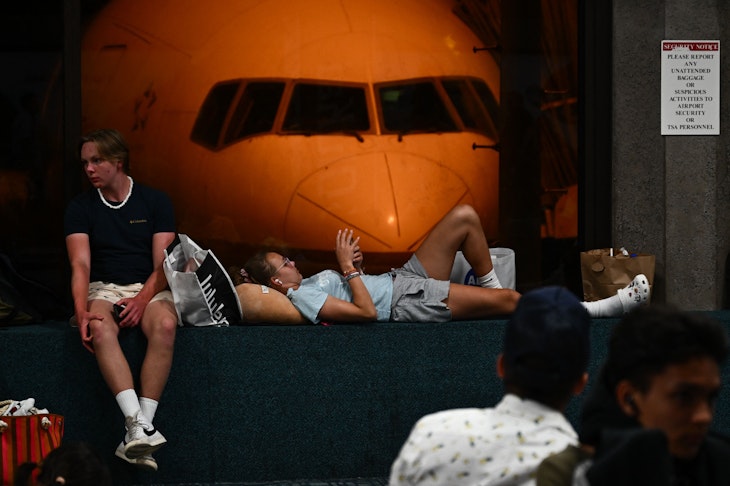 Travelers at airport in Maui trying to leave after wildfires