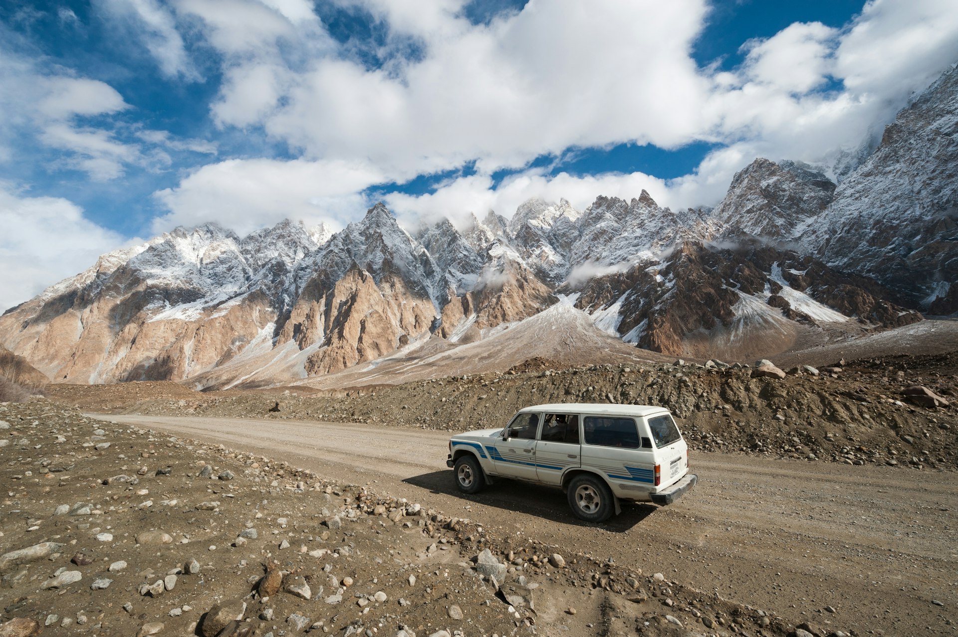 A 4WD on an empty section of the Karakoram Highway