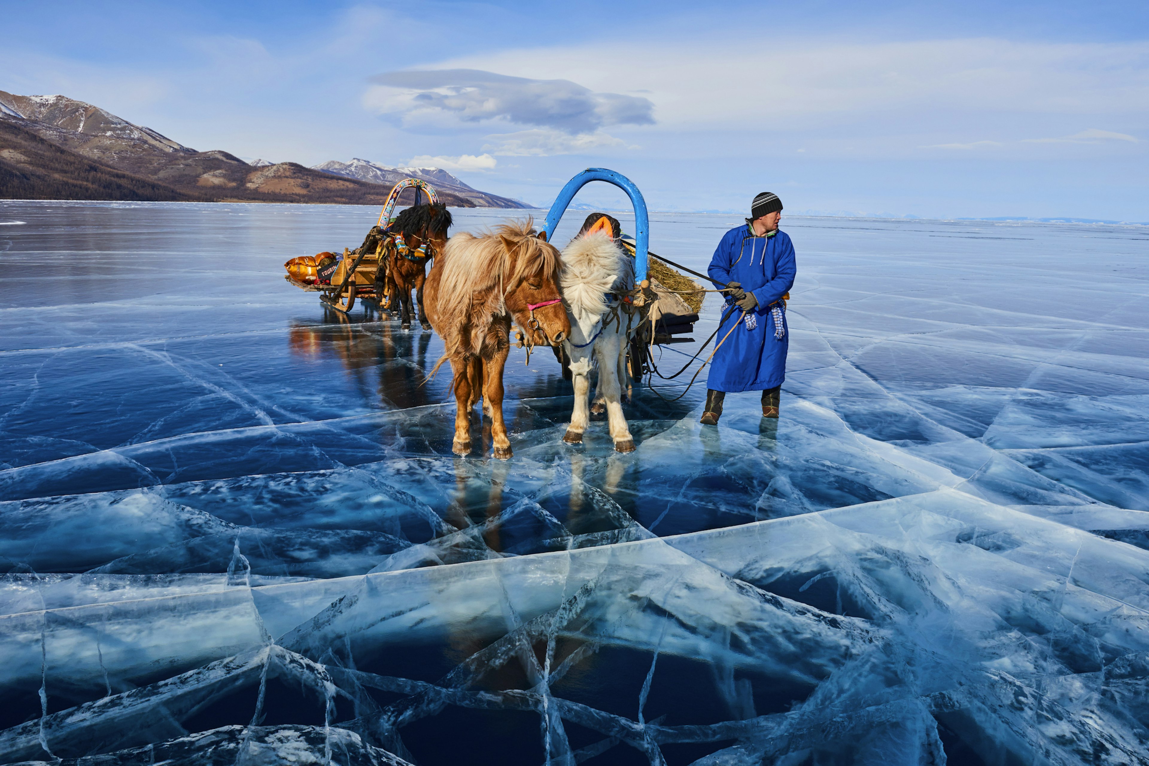 Horse sleds on the frozen surface of Khovsgol Nuur in Mongolia