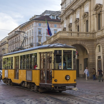 Old tram passing at La Scala theatre in Milan
People Built Structure Mode of Transport Town City Cityscape Cable Journey Communication History Architecture Environment Road Transportation Land Vehicle Horizontal Outdoors House Europe Opera Italy Car Cable Car Train - Vehicle Street Orange Color Old Old-fashioned Cultures Italian Culture Milan Springtime Railroad Track Movie Theater Opera House Traffic Track - Imprint Downtown District La Scala Theatre City Life Tramway Building Exterior Photography Electricity Tourism Travel