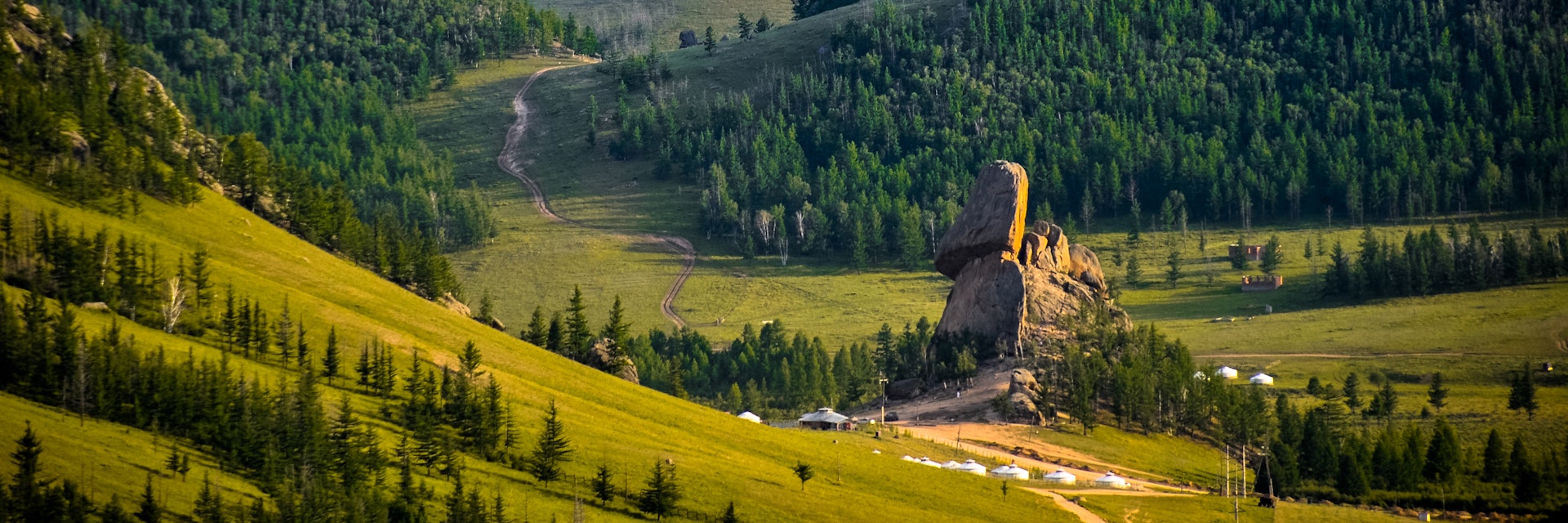 The Turtle Rock at Terelj National Park in Mongolia.
Beauty; Beauty In Nature; Capital Cities; Color Image; Day; Environmental Conservation; Gorkhi-terelj National Park; Green Color; Hill; Horizontal; Independent Mongolia; Landscape; Mountain; Mountain Range; Mountain Road; National Landmark; Nature; No People; Outdoors; Park - Man Made Space; Photography; Plant; Rock - Object; Scenics; Sky; Sunset; Tranquil Scene; Travel Destinations; Tree; Turtle; Turtle Rock; Ulan Bator;