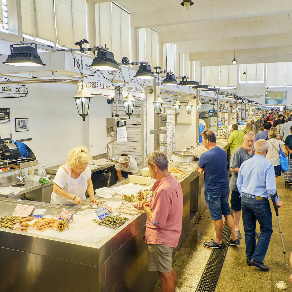 Cadiz, Spain. Citizens shopping in Cadiz downtown Market, Mercado Central de Abastos. Cadiz, Andalusia, Spain.