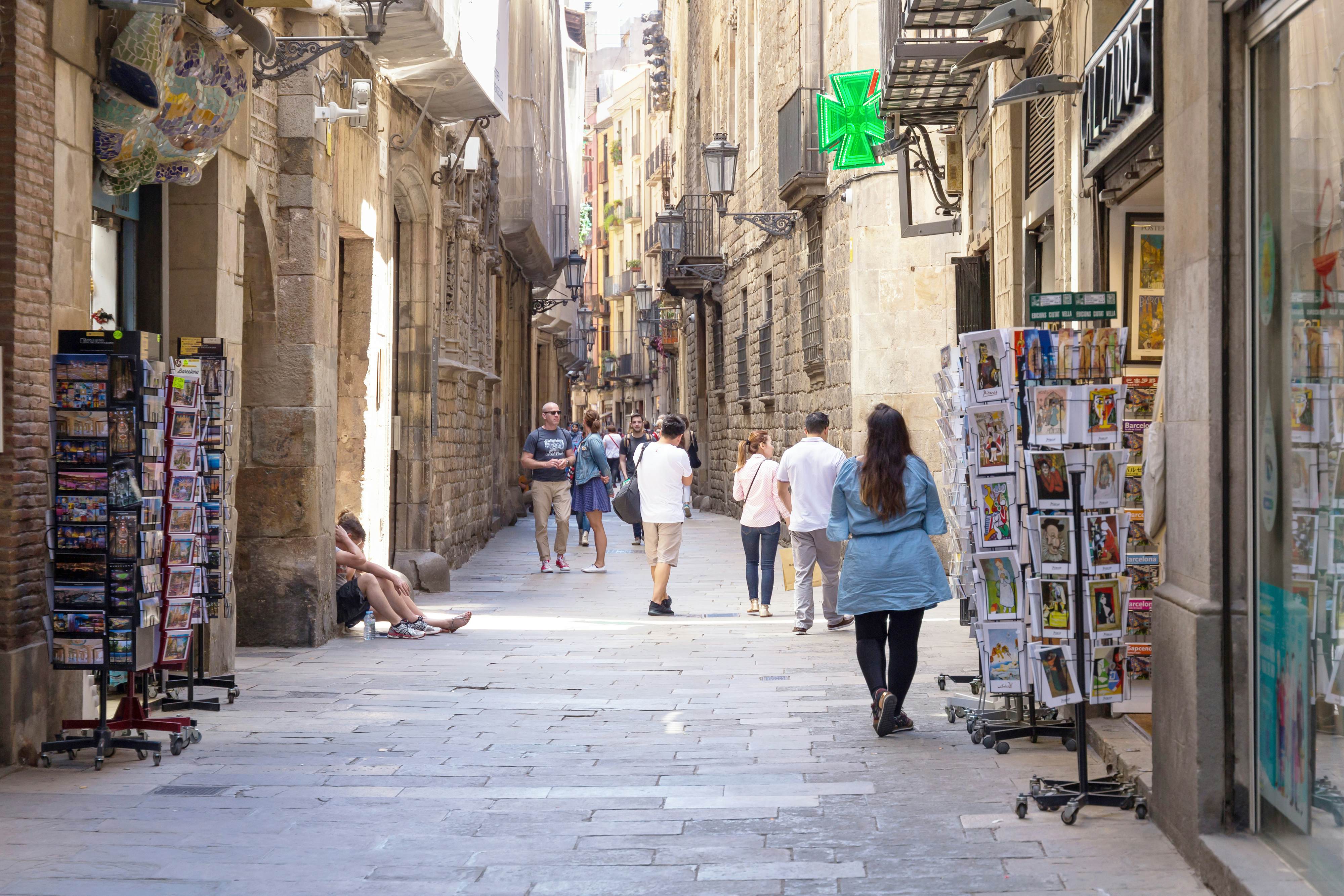BARCELONA, SPAIN. Unknown people walking on the Carrer de Montcada street in historical part of Barcelona.