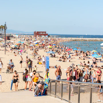 Platja de la Nova Icària beach with people in summer after COVID 19 on June 26, 2020 in Barcelona, Spain.