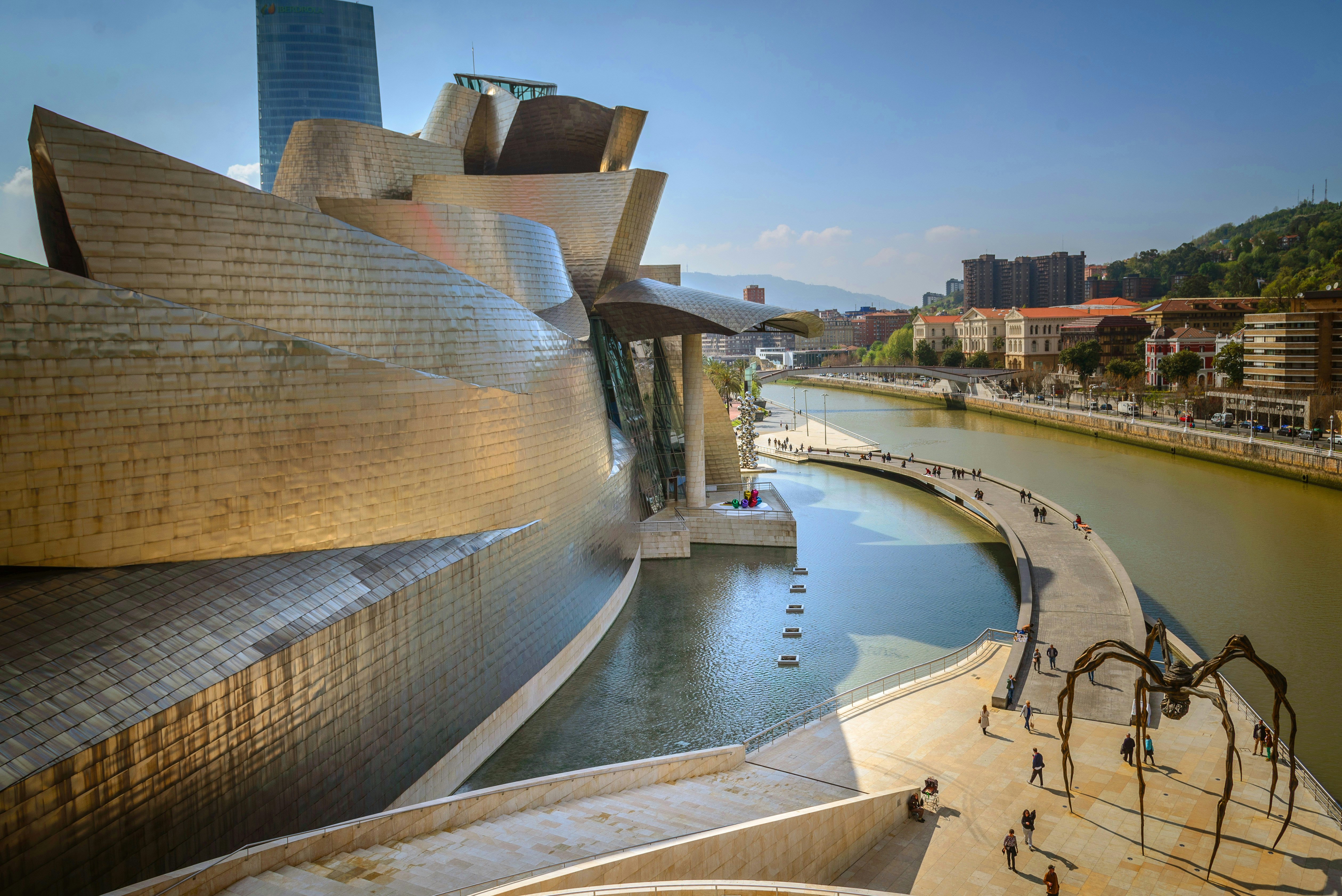 Guggenheim Museum, Bilbao, Spain, Architect Frank Gehry, 1997, Guggenheim Museum Detail Of Curving Titanium Wall. Guggenheim Museum Bilbao is a museum of modern and contemporary art. Built alongside the Nervion River, which runs through the city of Bilbao to the Cantabrian Sea.