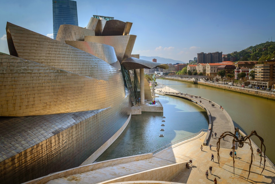 Guggenheim Museum, Bilbao, Spain, Architect Frank Gehry, 1997, Guggenheim Museum Detail Of Curving Titanium Wall. Guggenheim Museum Bilbao is a museum of modern and contemporary art. Built alongside the Nervion River, which runs through the city of Bilbao to the Cantabrian Sea.