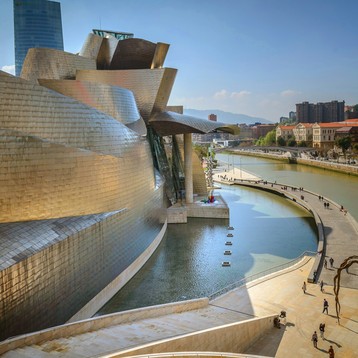 Guggenheim Museum, Bilbao, Spain, Architect Frank Gehry, 1997, Guggenheim Museum Detail Of Curving Titanium Wall. Guggenheim Museum Bilbao is a museum of modern and contemporary art. Built alongside the Nervion River, which runs through the city of Bilbao to the Cantabrian Sea.