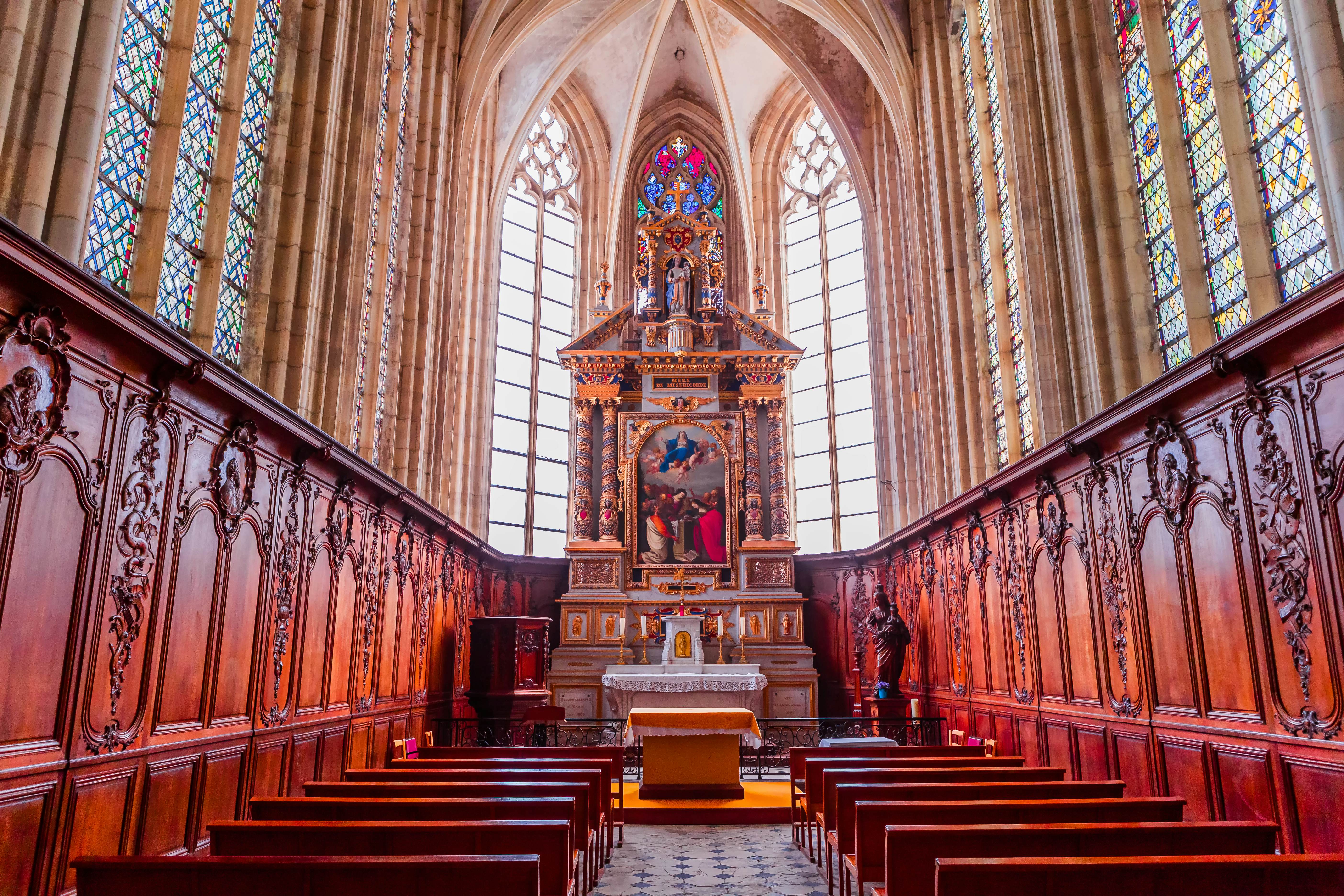 Central nave and altar of church Abbatiale de la Trinite in Fecamp, France.