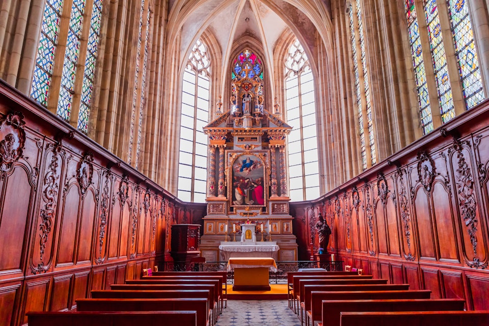 Central nave and altar of church Abbatiale de la Trinite in Fecamp, France.