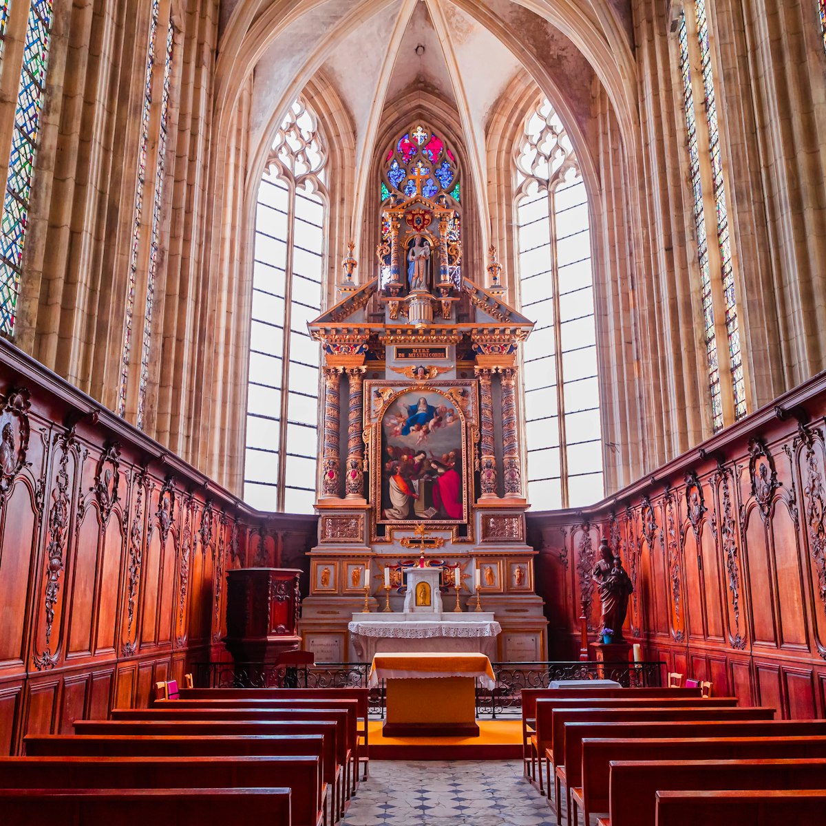 Central nave and altar of church Abbatiale de la Trinite in Fecamp, France.