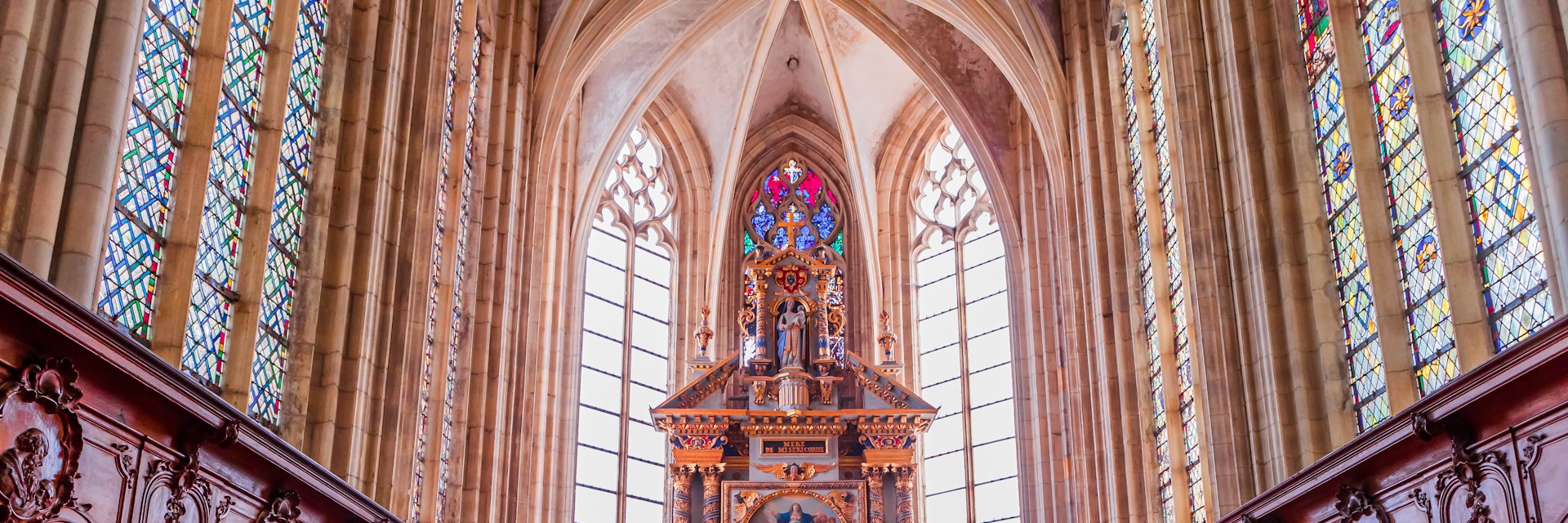 Central nave and altar of church Abbatiale de la Trinite in Fecamp, France.