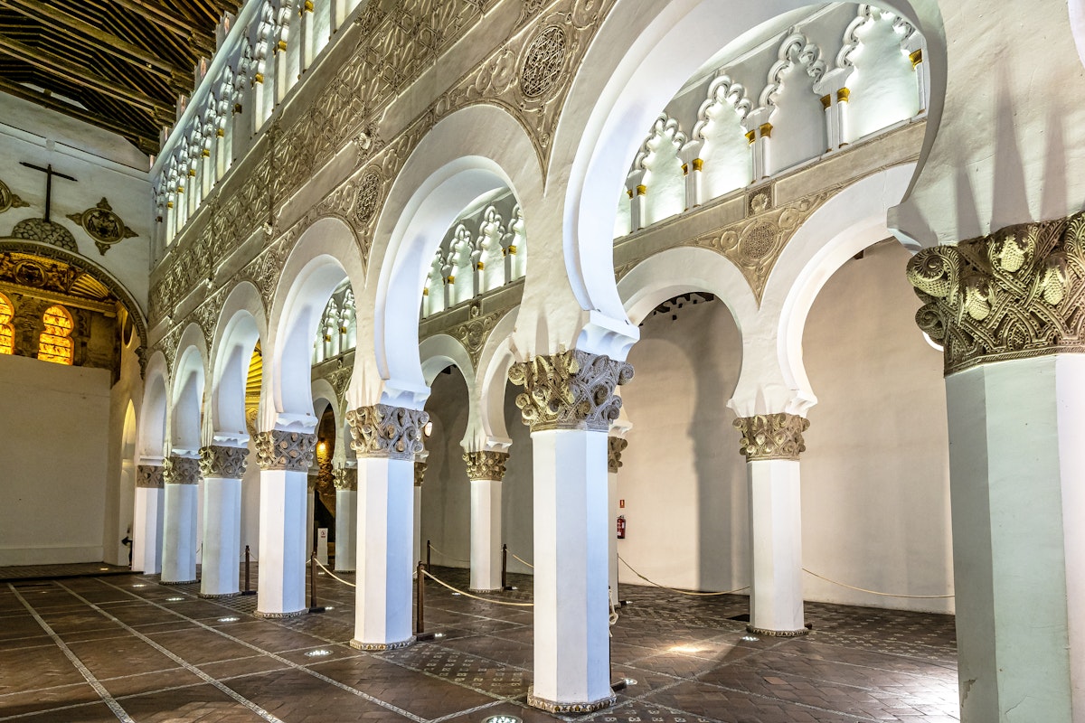White arches at Ancient Sinagoga de Santa Maria La Blanca, Synagogue in the historical center of Toledo, Spain. Erected in 1180 and is considered the oldest synagogue building in Europe still standing.