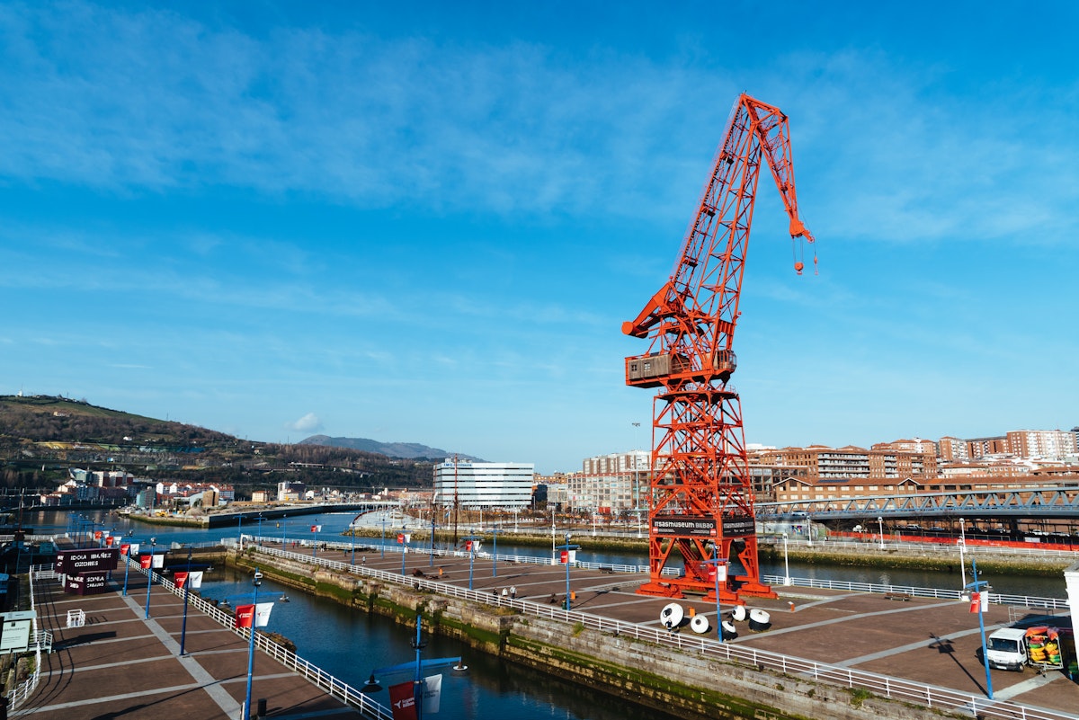 Bilbao, Spain - February 13, 2022: View of Carola Crane. It is a crane that was once used in shipbuilding at the Astilleros Euskalduna shipyard, now is part of Maritime Museum.