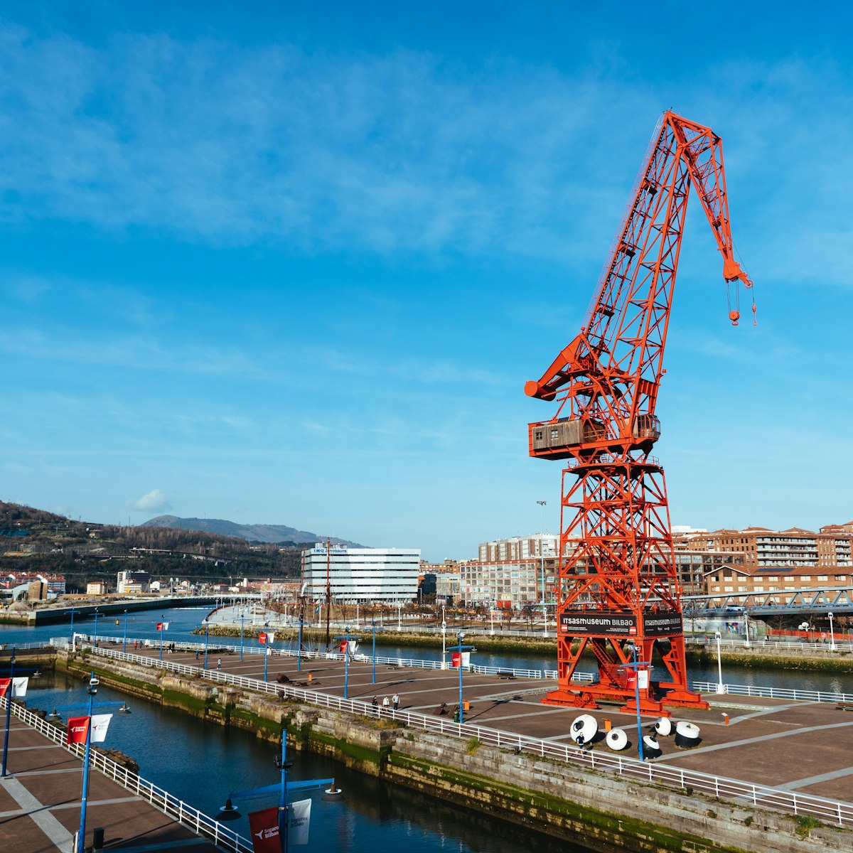 Bilbao, Spain - February 13, 2022: View of Carola Crane. It is a crane that was once used in shipbuilding at the Astilleros Euskalduna shipyard, now is part of Maritime Museum.