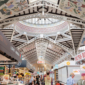 Valencia, Spain - july 2022: Interior Spaces, People and Architecture of the Mercado Central, the principal Food Market in Valencia, Spain.