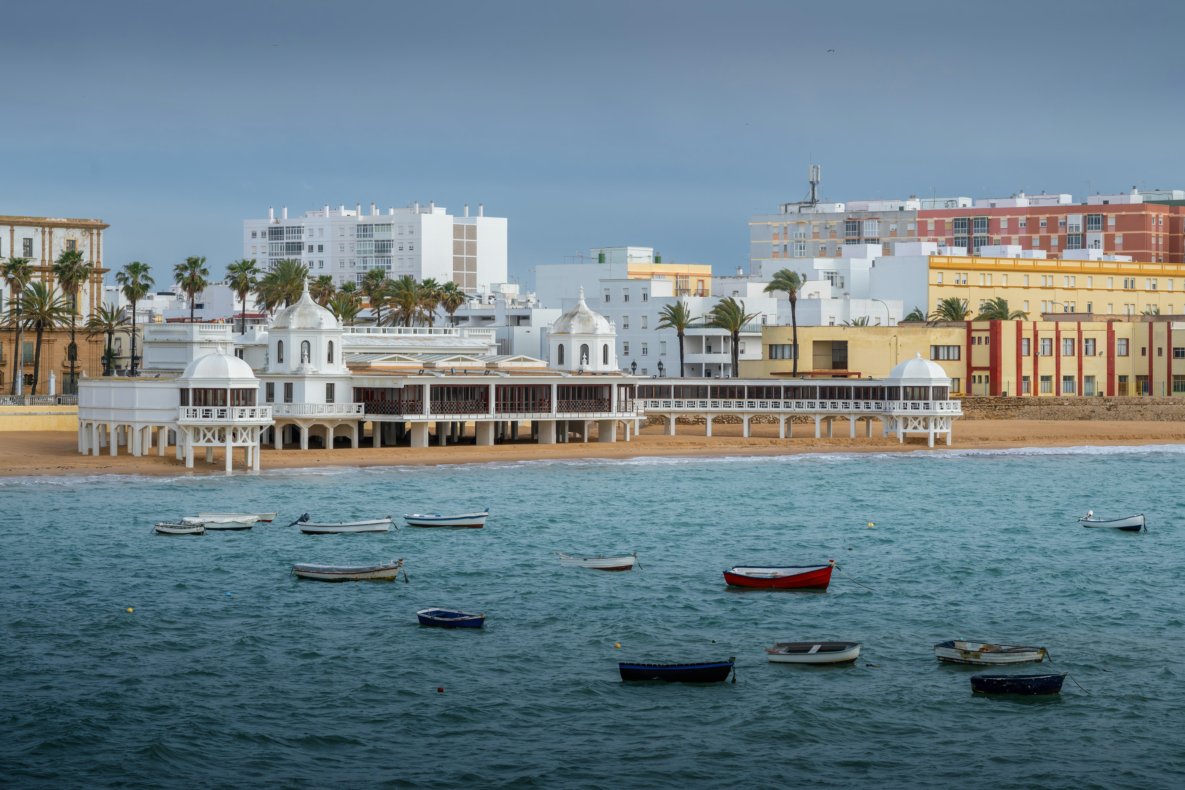 The bathhouse at Playa de la Caleta beach at sunset in Cadiz, Andalusia, Spain.