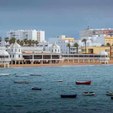 La Caleta Beach and Balneario de la Palma Building - Cadiz, Andalusia, Spain.