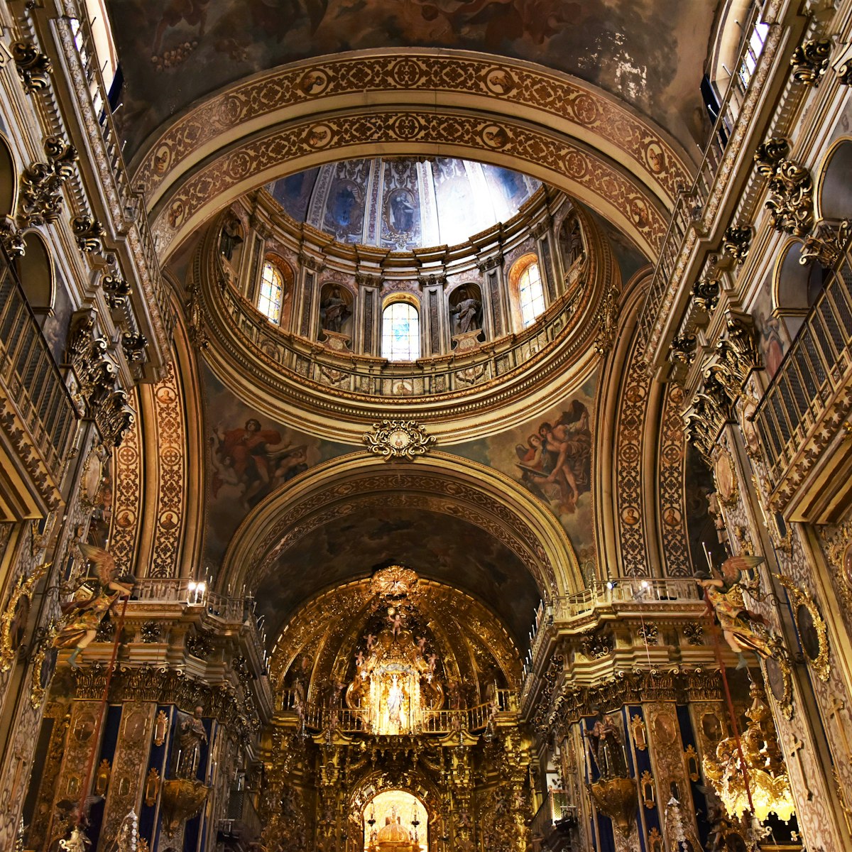 Inside the Gleaming Golden Basilica of San Juan de Dios.