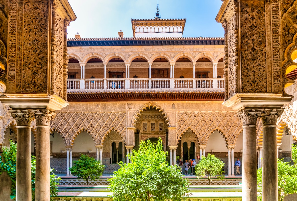 Moorish architecture of beautiful castle called Real Alcazar in Seville, Andalusia, Spain.