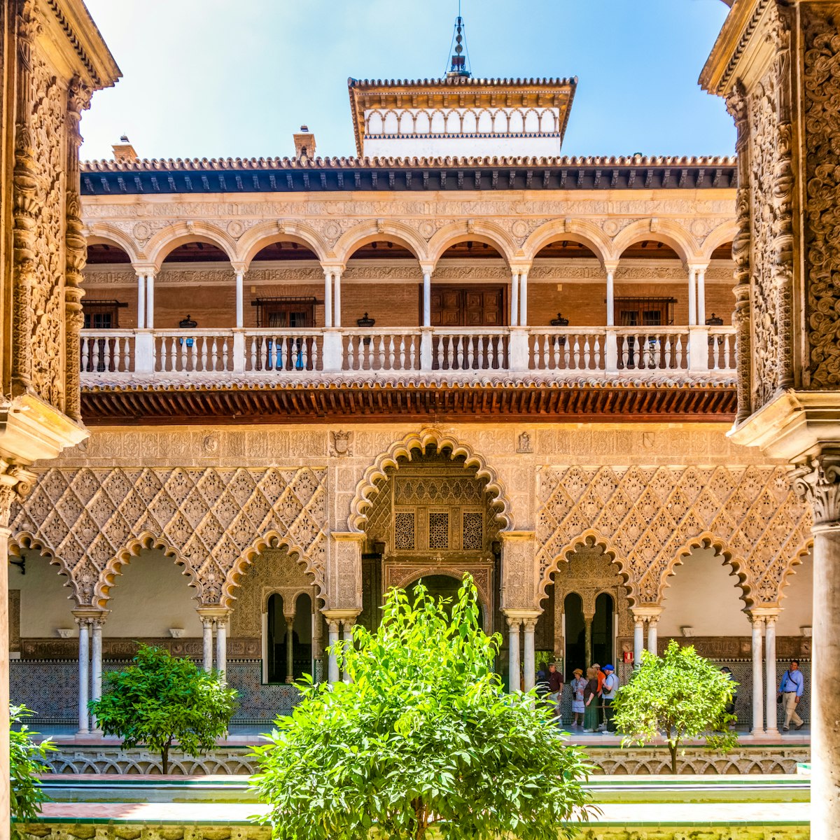 Moorish architecture of beautiful castle called Real Alcazar in Seville, Andalusia, Spain.