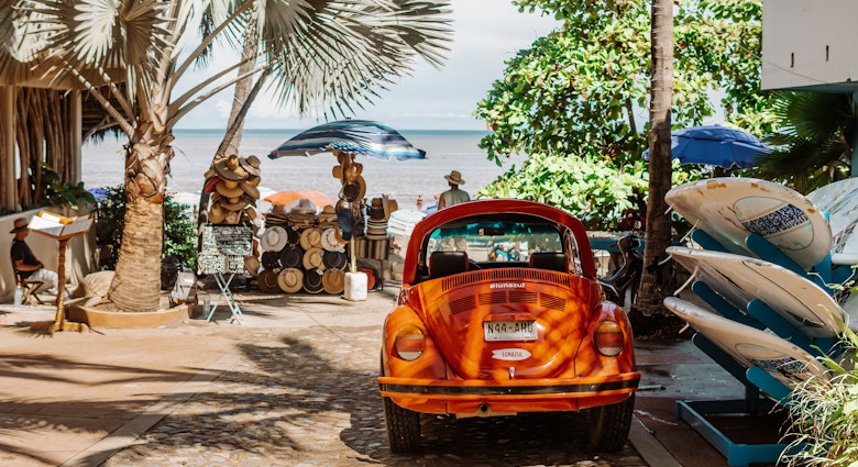 Sayulita, Mexico - September 16, 2021 - street photography of red VW Beetle vocho, a hat shop, and surfboards on Sayulita Beach; Shutterstock ID 2045735411; your: -; gl: -; netsuite: -; full: -
2045735411
