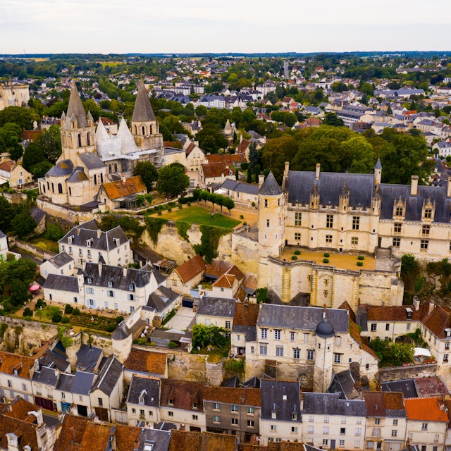 Aerial view of historic center of Loches town overlooking ancient Chateau of Anjou family with collegiate church, royal lodge and donjon.