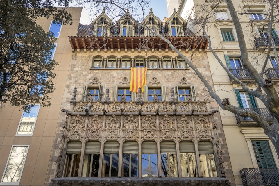 Barcelona, Spain - March 10, 2022 - Palau del Baró de Quadras is a 1906 modernist palace by architect Josep Puig, featuring ornate Gothic Arabesque-inspired details.