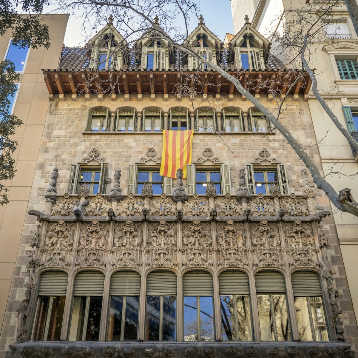 Barcelona, Spain - March 10, 2022 - Palau del Baró de Quadras is a 1906 modernist palace by architect Josep Puig, featuring ornate Gothic Arabesque-inspired details.