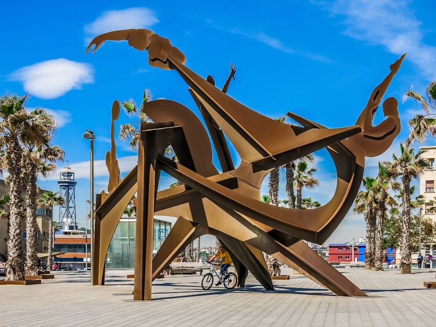 Sculpture Homenaje a la Natacio by Alfredo Lenz on Placa del Mar, Barceloneta in Barcelona, Spain.