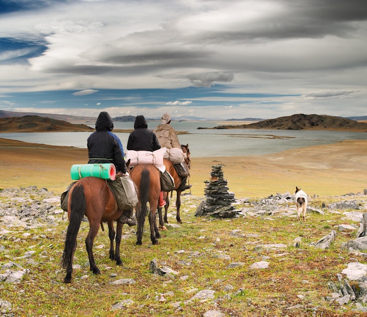 Horseriders in mongolian wilderness; Shutterstock ID 4176595; your: Claire Naylor; gl: 65050; netsuite: Online editorial; full: Mongolia getting around
4176595