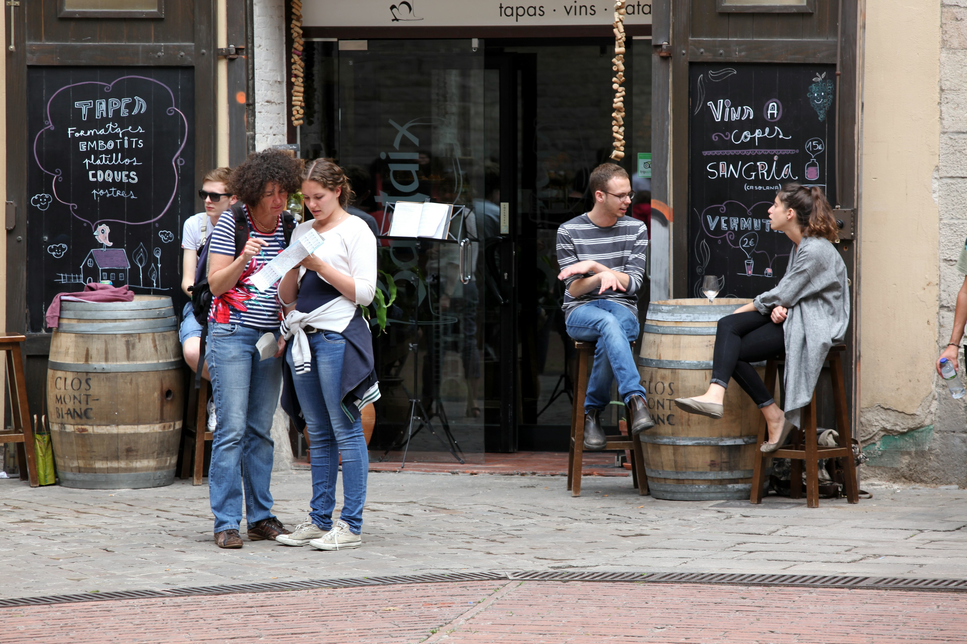 Diners at a cafe sidewalk in Barcelona Spain