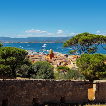 St Tropez old town with the clock tower and harbour, as seen from the citadel.
1119505355
aerial, architecture, bay, boats, buildings, charming, citadel, city, cityscape, clock, coast, coastline, destination, europe, european, famous, france, french, harbor, hill, historic, holiday, landscape, mediterranean, nature, old town, outdoor, panorama, panoramic, port, riviera, rooftops, saint tropez, scenic, sea, sky, southern france, st tropez, summer, tourism, tourist, tower, town, travel, trees, vacation, view, village, water, yachts