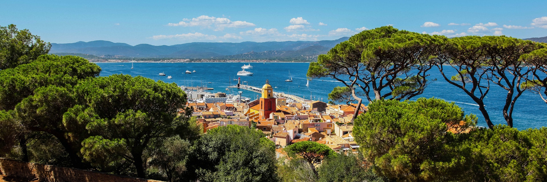 St Tropez old town with the clock tower and harbour, as seen from the citadel.
1119505355
aerial, architecture, bay, boats, buildings, charming, citadel, city, cityscape, clock, coast, coastline, destination, europe, european, famous, france, french, harbor, hill, historic, holiday, landscape, mediterranean, nature, old town, outdoor, panorama, panoramic, port, riviera, rooftops, saint tropez, scenic, sea, sky, southern france, st tropez, summer, tourism, tourist, tower, town, travel, trees, vacation, view, village, water, yachts