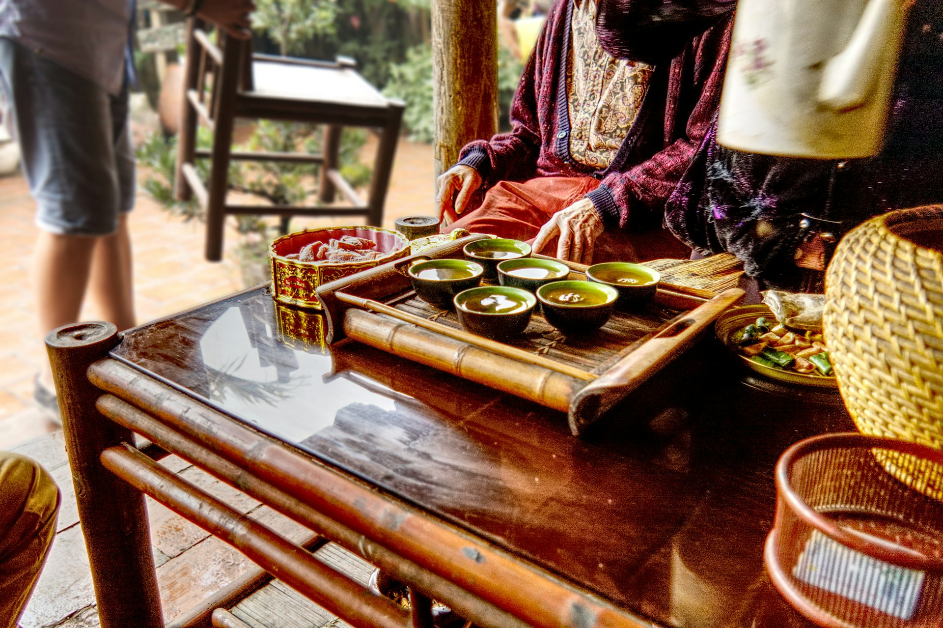 Green Tea and Ginger Candy being served in old village house in Vietnam