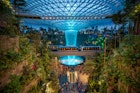 MAY 19, 2019: The Rain Vortex inside the Jewel Changi Airport at night.
1402131020
airport, architecture, asia, attraction, avatar, building, changi, concept, day, design, development, facility, forest, fountain of wealth, garden, giant, green, greenhouse, indoor, inside, jewel, landmark, landscape, largest, laser, leisure, light, made, mall, mega, modern, nature, night, park, people, plant, rain, shopping, show, showing, singapore, tallest, terminal, tourism, travel, tree, urban, vortex, waterfall, world