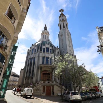 Exterior of Notre Dame des Malades church, built in the 20th century in the art deco style, and and extension of the Sainte Blaise church in Vichy, France.