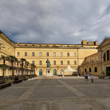 The main gate into Palais Fesch with the central museum of fine arts in Ajaccio on Corsica.