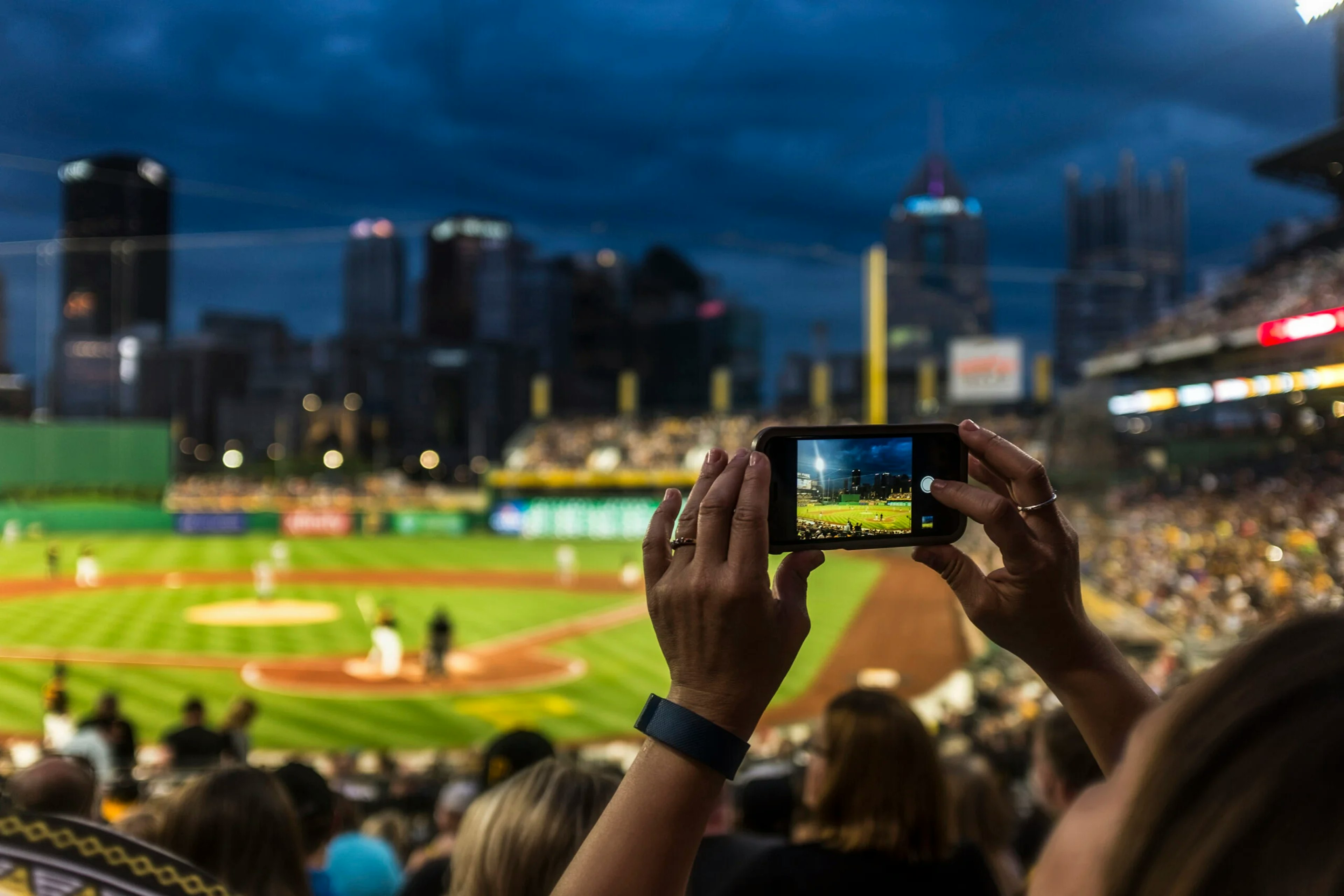 Snapping a photo in a baseball stadium