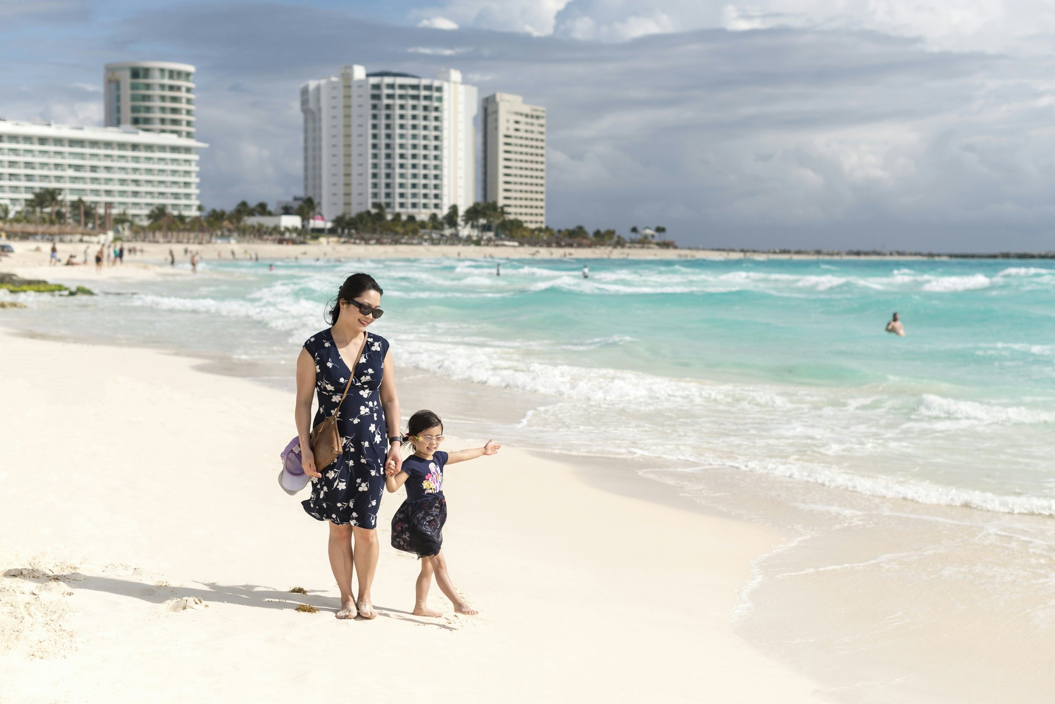 Mother and daughter admiring the Caribbean sea