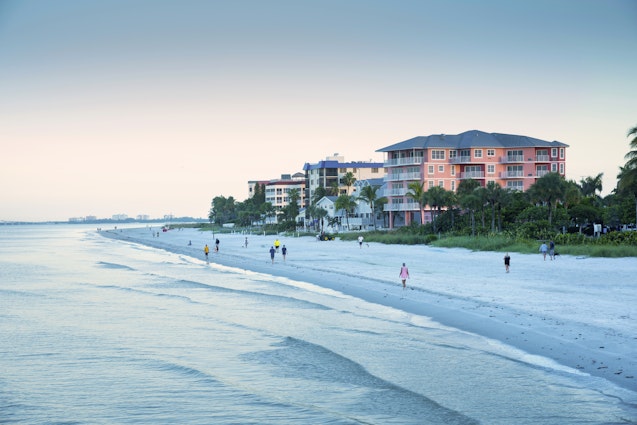 Sunrise brings beach walkers to Fort Myers Beach located on Estero Island along the Gulf of Mexico.
1094659832