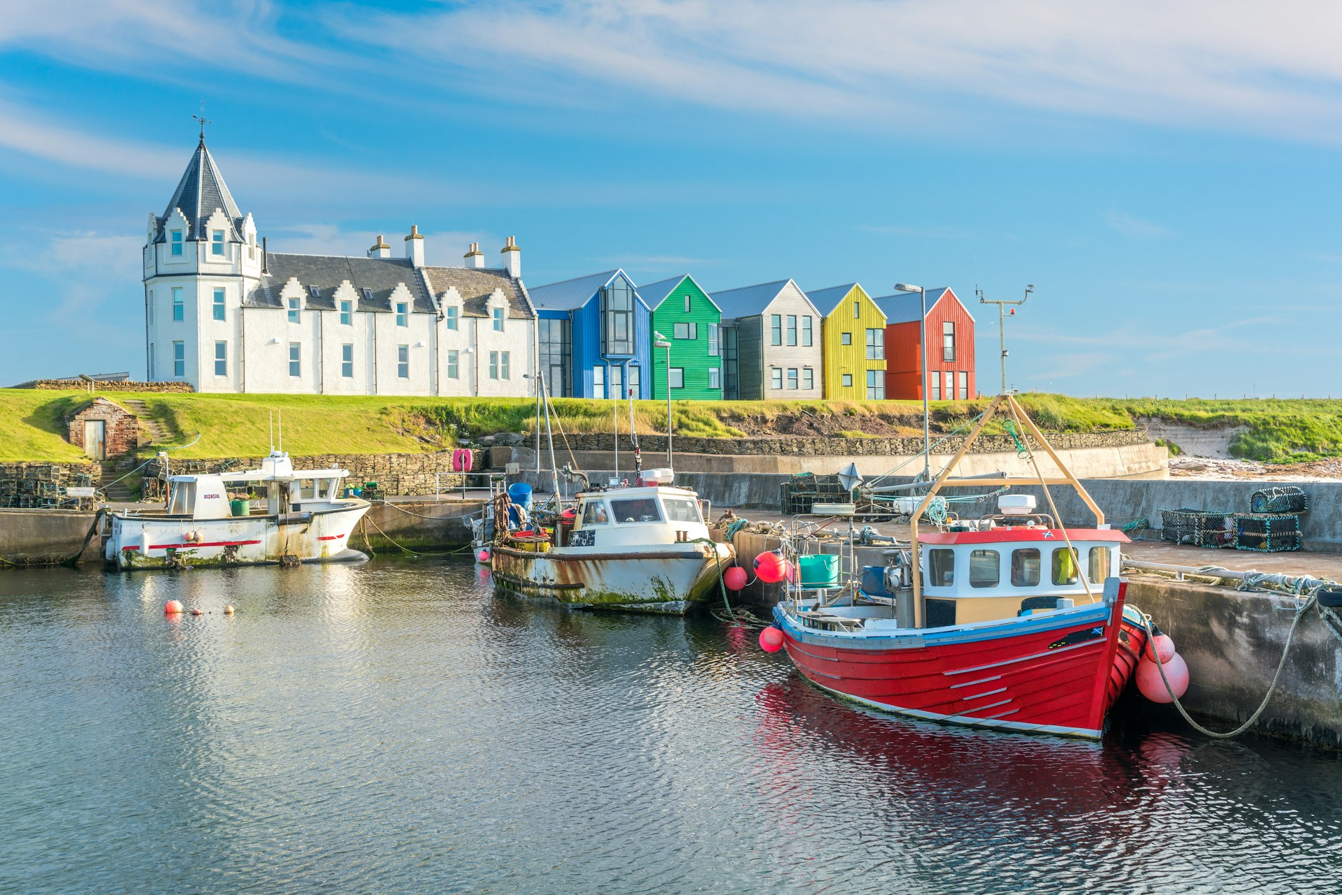 The colorful buildings of John O’Groats in a sunny afternoon, Caithness county, Scotland