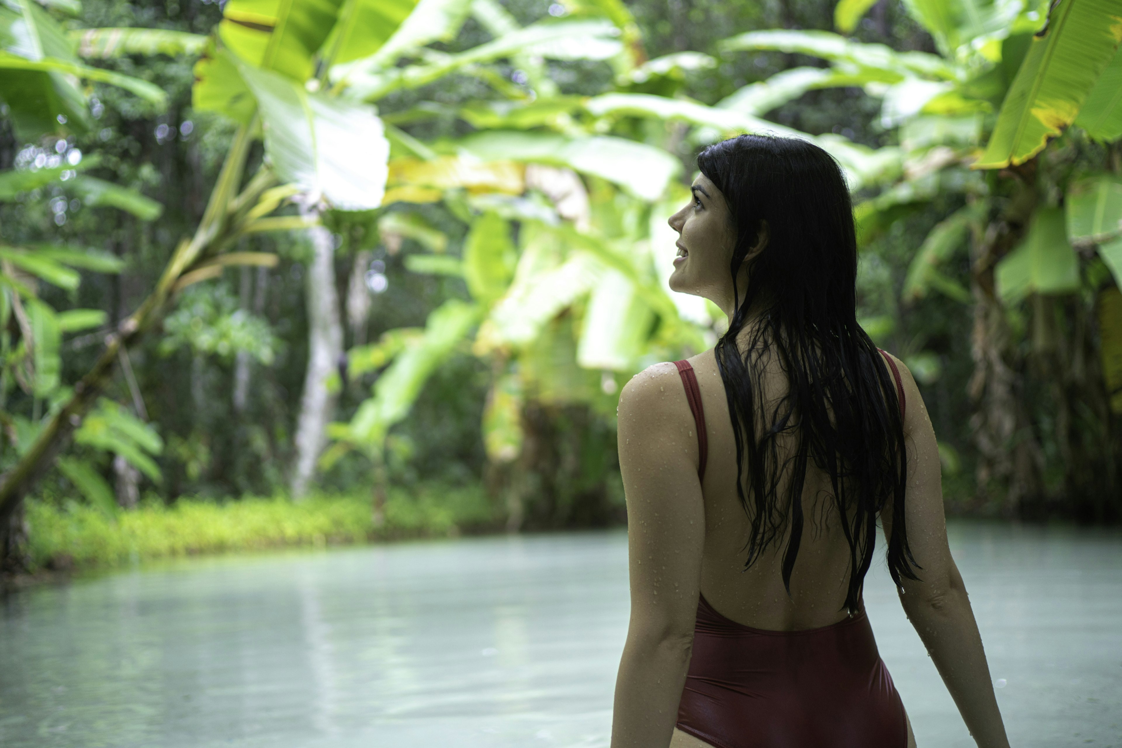 A woman in a swimsuit in a natural pool in Jalapão State Park, Brazil