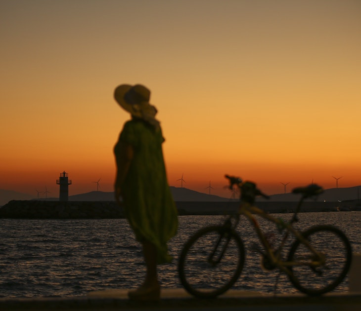 IZMIR, TURKEY - JULY 14: A woman walks near a coastline with her bicycle during sunrise in Foca district of Izmir, Turkey on July 14, 2021. (Photo by Ismail Duru/Anadolu Agency via Getty Images)
1233967343
sunrise