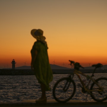IZMIR, TURKEY - JULY 14: A woman walks near a coastline with her bicycle during sunrise in Foca district of Izmir, Turkey on July 14, 2021. (Photo by Ismail Duru/Anadolu Agency via Getty Images)
1233967343
sunrise
