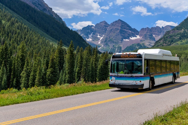 Some mountain towns offer free shuttle services to scenic lookouts in summer and ski resorts in winter. Sean Xu/Getty Images