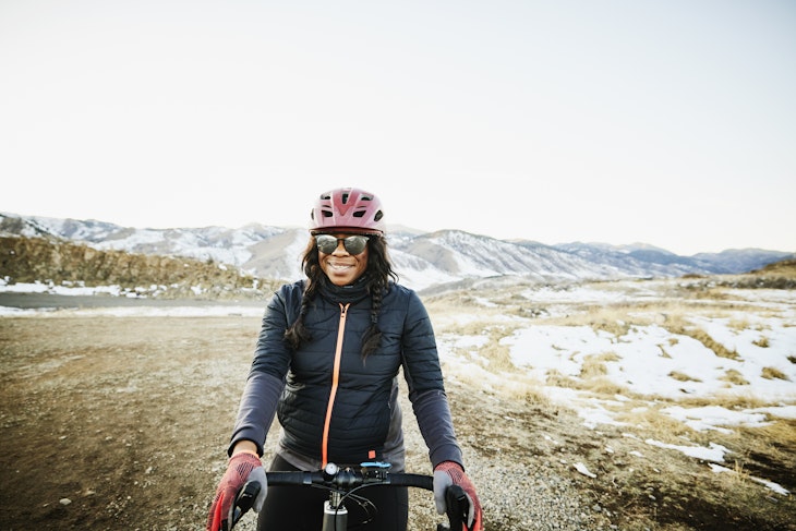 1291588868
A black woman riding her bike in the Colorado countryside