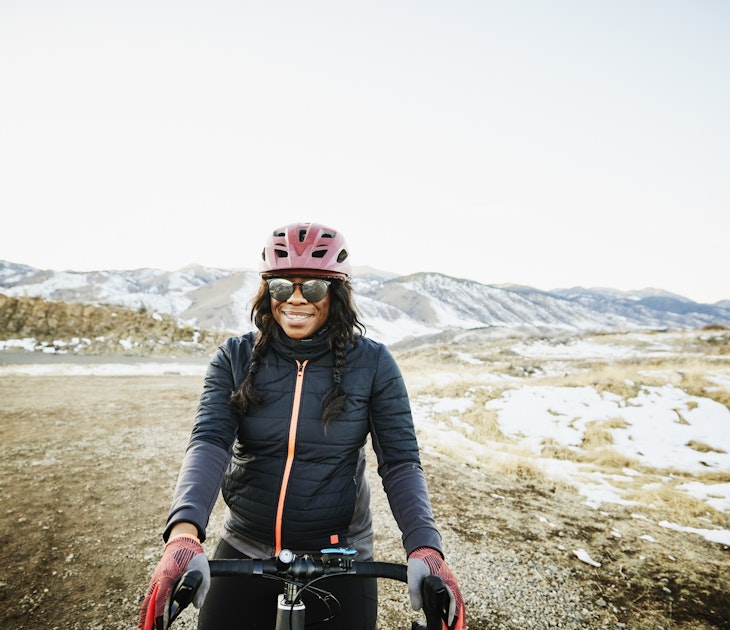 1291588868
A black woman riding her bike in the Colorado countryside