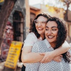 Two women embracing and smiling in Santiago de Chile